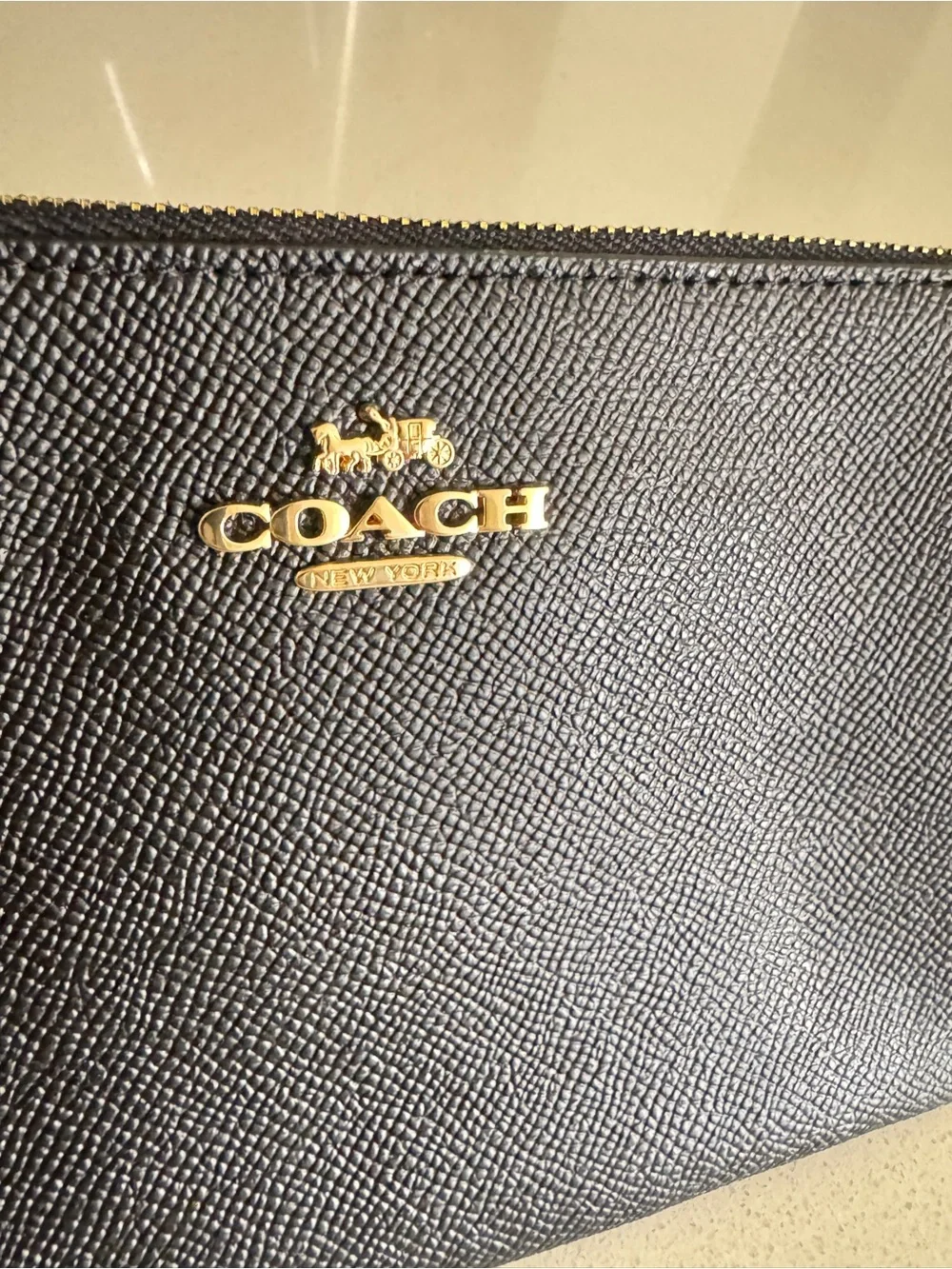 Coach Black Leather Wristlet Pouch with Gold Logo